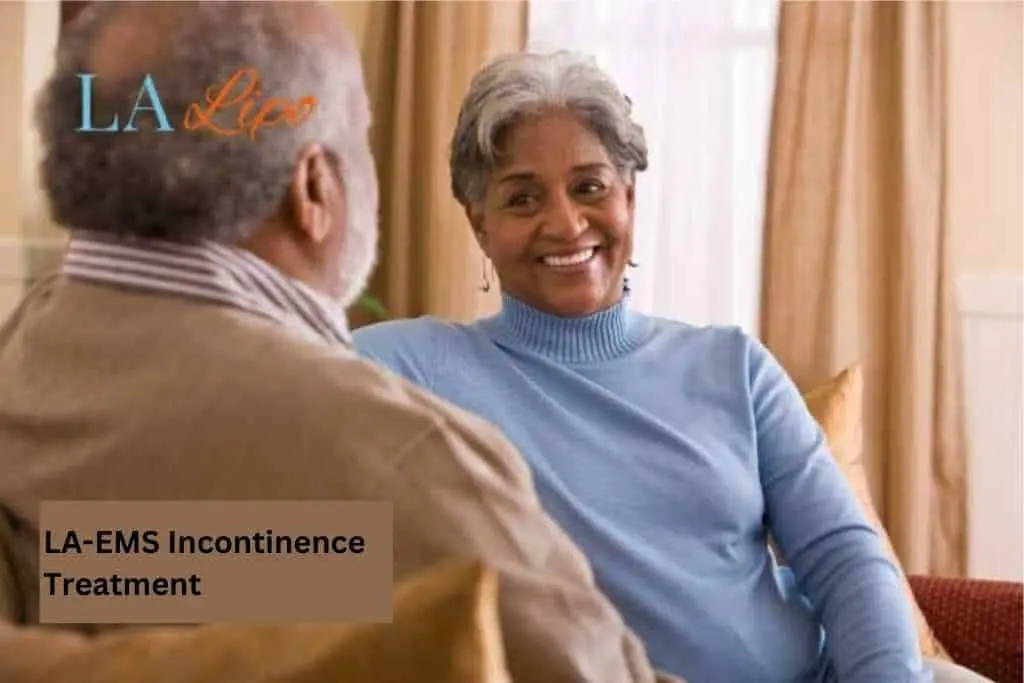 Couple sat smiling at each other - LA-EMS treatment Huntingdon
