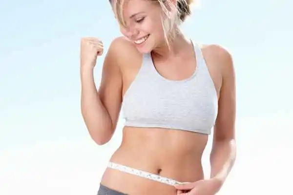 woman happy after fat reduction treatment Huntingdon