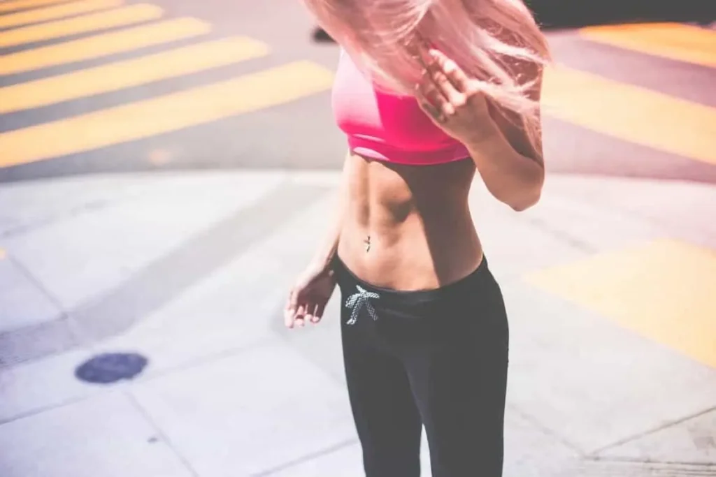Woman with toned stomach after LA-EMS Body Sculpting Treatment Huntingdon 